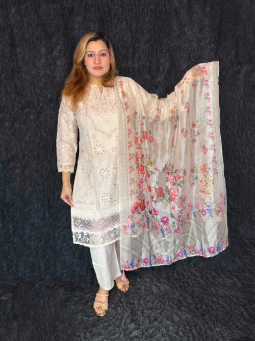 Bangladeshi woman wearing a stylish mustard floral printed kameez co-ord set, standing at the center in a studio setup for Pineapple BD fashion catalog