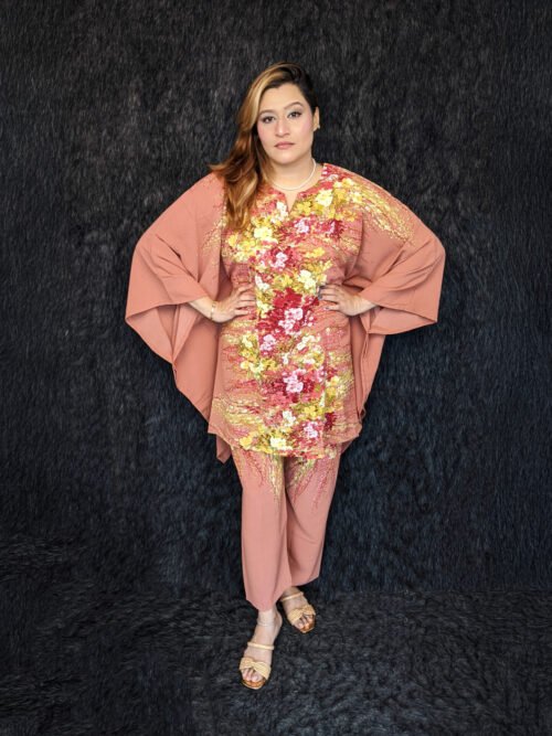 Bangladeshi woman wearing a stylish mustard floral printed kameez co-ord set, standing at the center in a studio setup for Pineapple BD fashion catalog